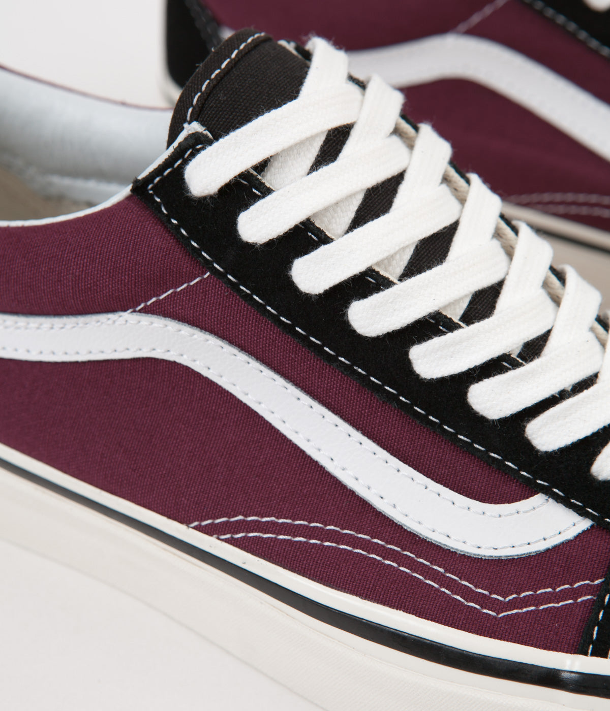 burgundy and black old skool vans