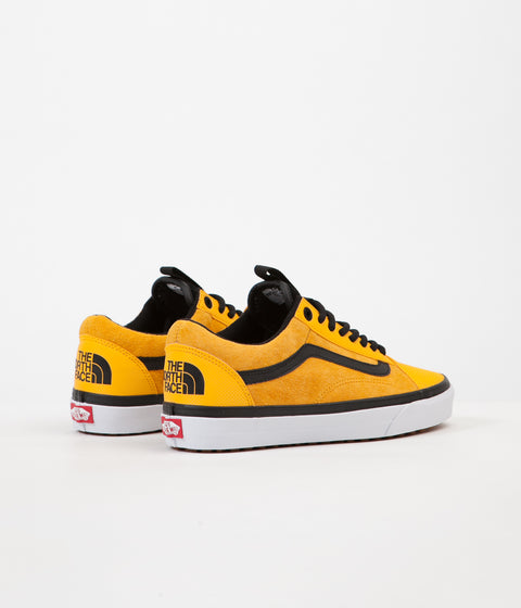 yellow vans with black stripe