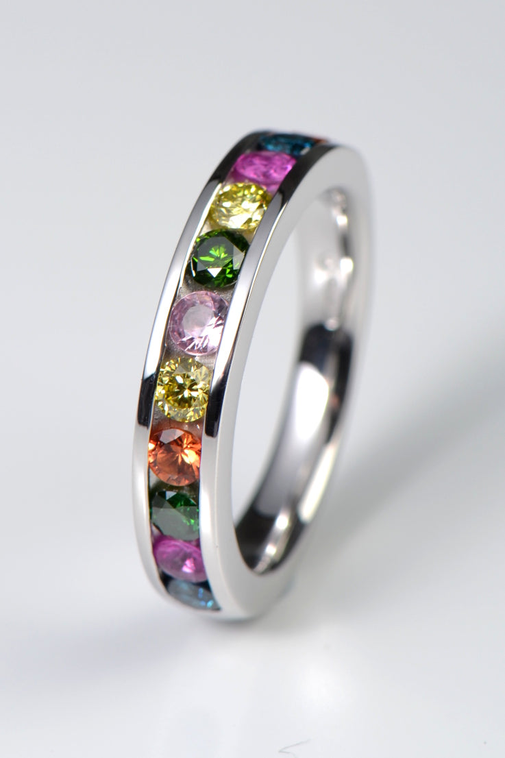 sapphire and diamond ring with lots of different colours