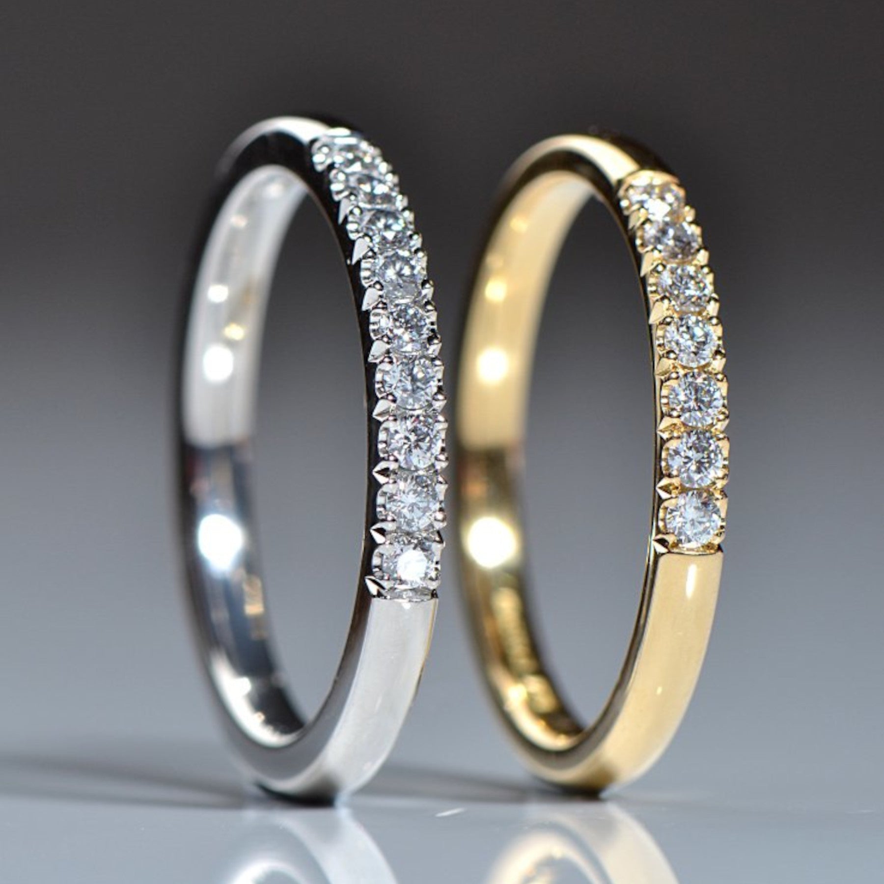 diamond castle set eternity rings in platinum and yellow gold