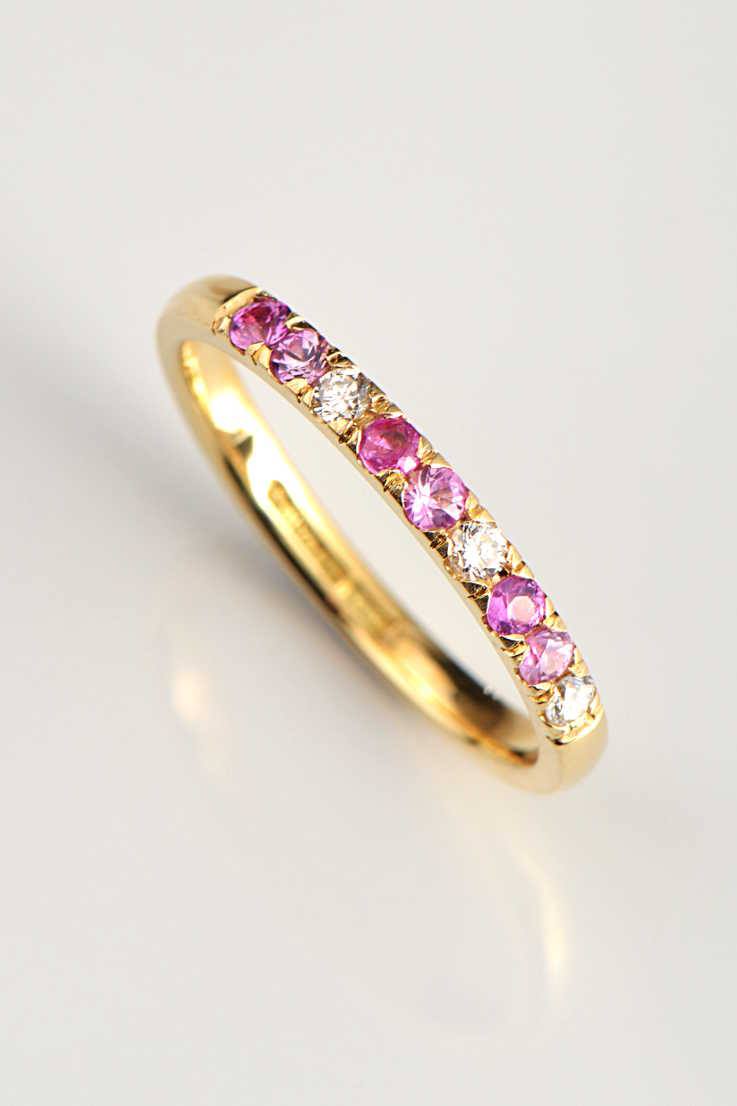 pink sapphire and diamond yellow gold eternity ring