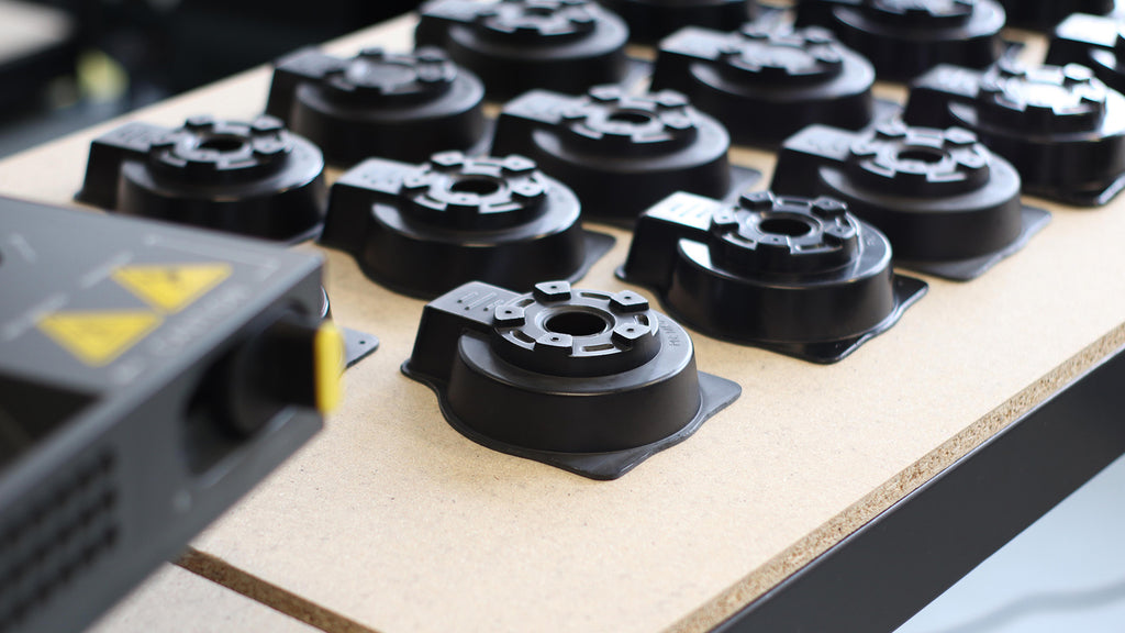 An array of ABS formed parts made with the Mayku Multiplier