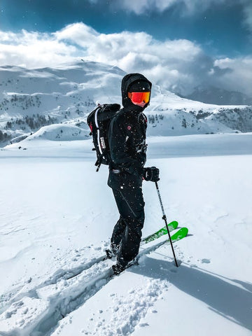 snowboarder wearing a backpack