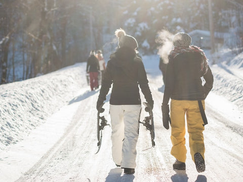 two skiers