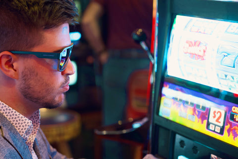 a man playing slots