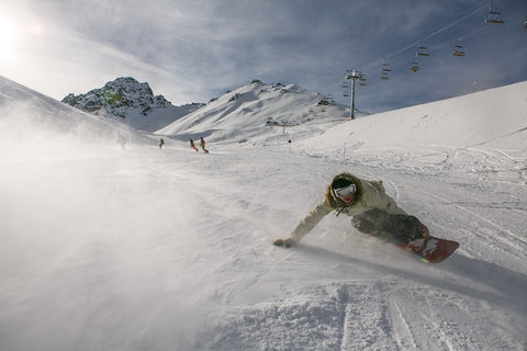 men snowboarding