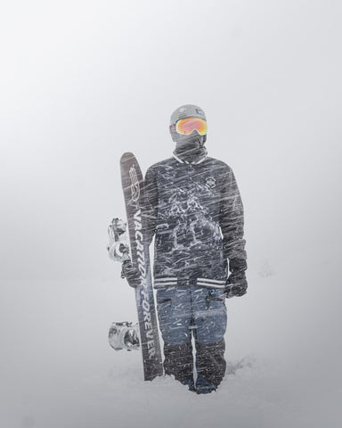 snowboarder in snow