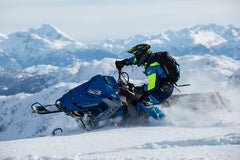 how to ride a snowmobile properly