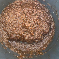 pear and chai jam mashed in a large pot