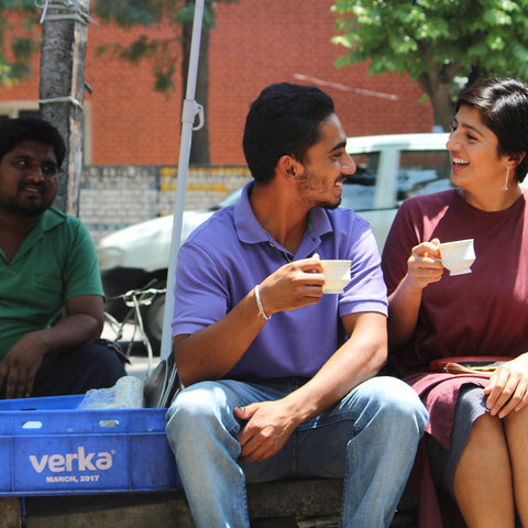 Uppma and friend in India drinking chai