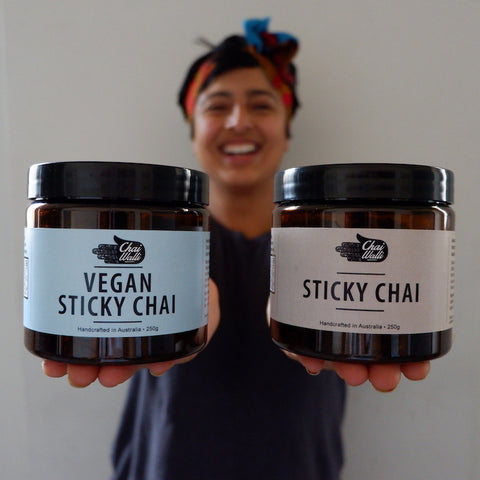 Uppma Virdi from Chai Walli holding up the two new sticky chai jars