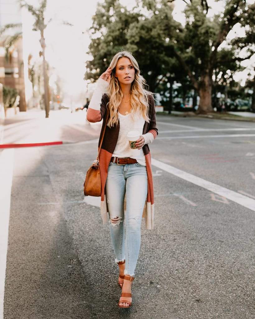 a woman walking down the street