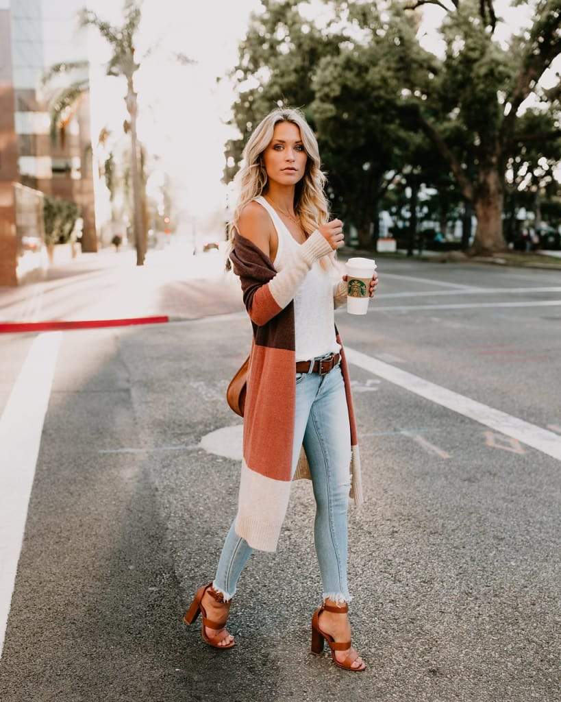 a woman walking down the street