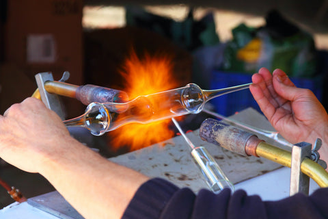 Man Glass Blowing a Bong