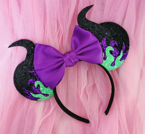 Minnie mouse ears inspired by Disney Villain maleficent with purple and green flames black horns and purple satin bow 