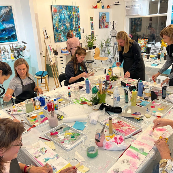 People having fun while painting at a private paint party at Artist Generations Art Studio in Valois Village, Pointe-Claire.
