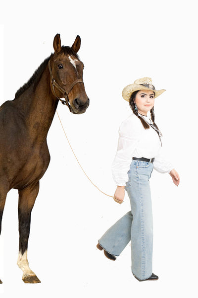 OTR Staff dressed as a cowgirl, leading a Photoshopped horse