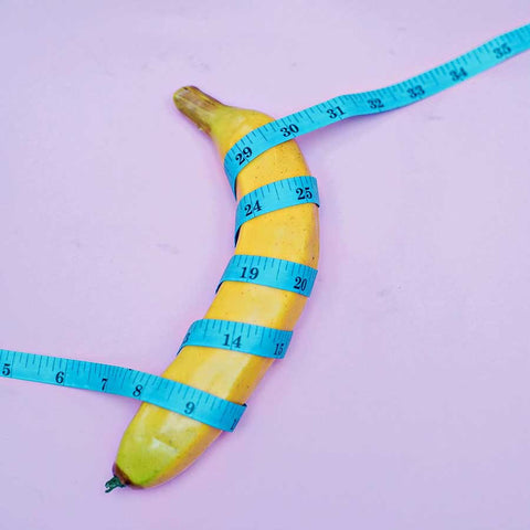 banana wrapped in a tape measure