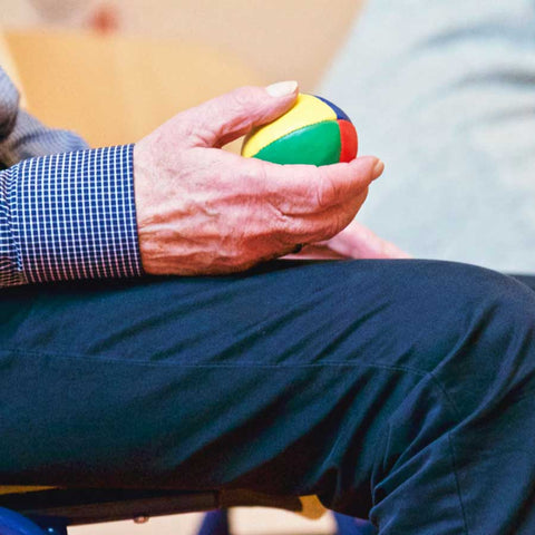 man massaging a ball