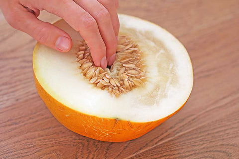 melon with fingers
