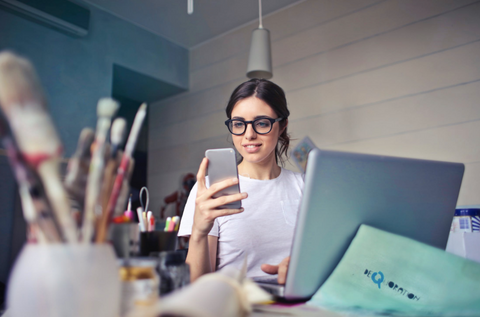 a woman using her phone