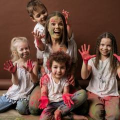 children celebrating Holi with colors