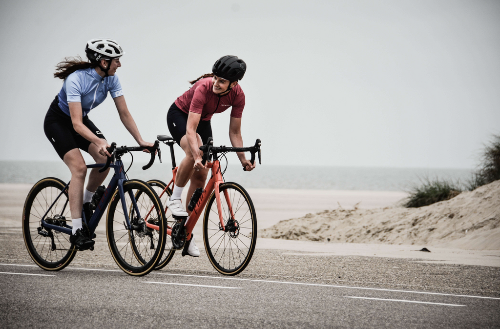 Two Women Biking