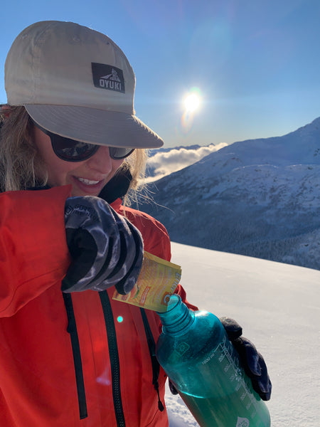 Anna Segal, pro freestyle skier, hydrates on the slopes with Ener-C