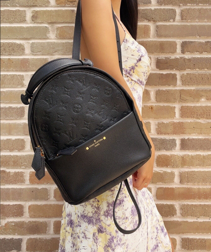 monogram empreinte leather backpack