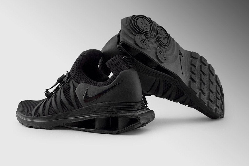 nike shox gravity triple black