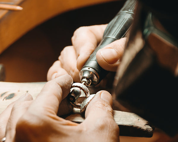 Bibi Cheung polishing a ring