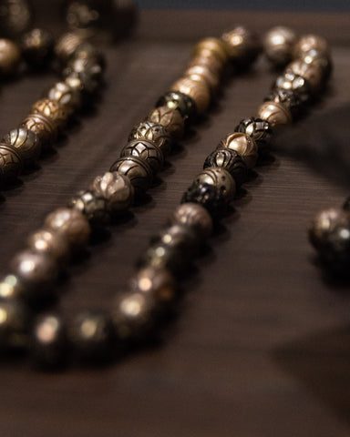 Close-up of carved Tahitian Pearls in TVRRINI booth at ExCeL London, 2022.