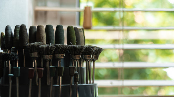 Different polishing burrs on a stand in the atelier of jewellery brand TVRRINI.