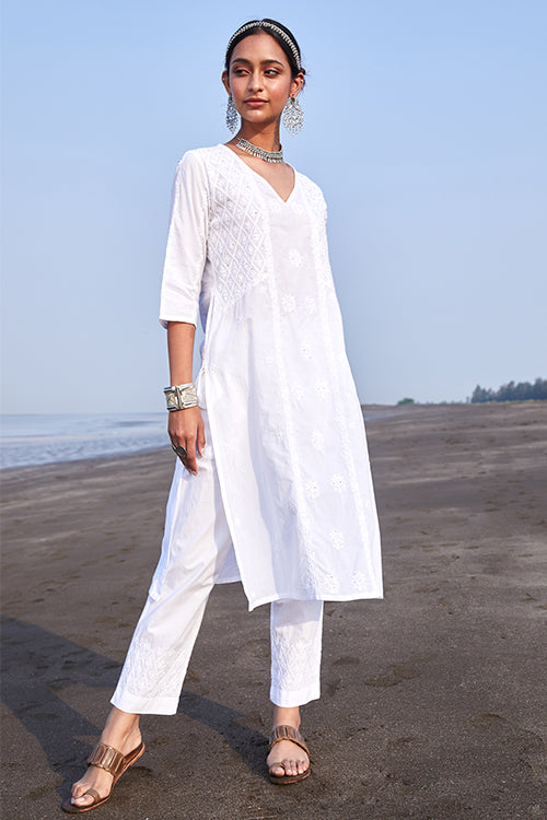 White flared dress with dupatta by Gulaal