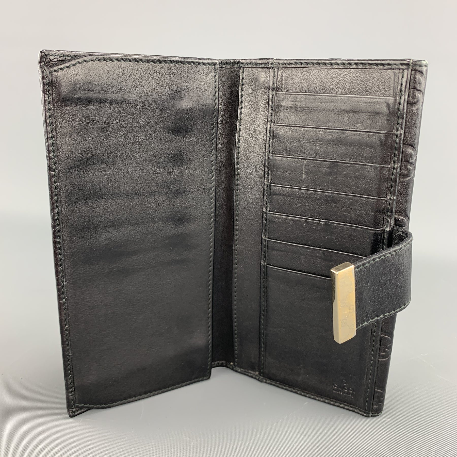 GUCCI Monogram Embossed Black Leather Checkbook Wallet – Sui Generis  Designer Consignment