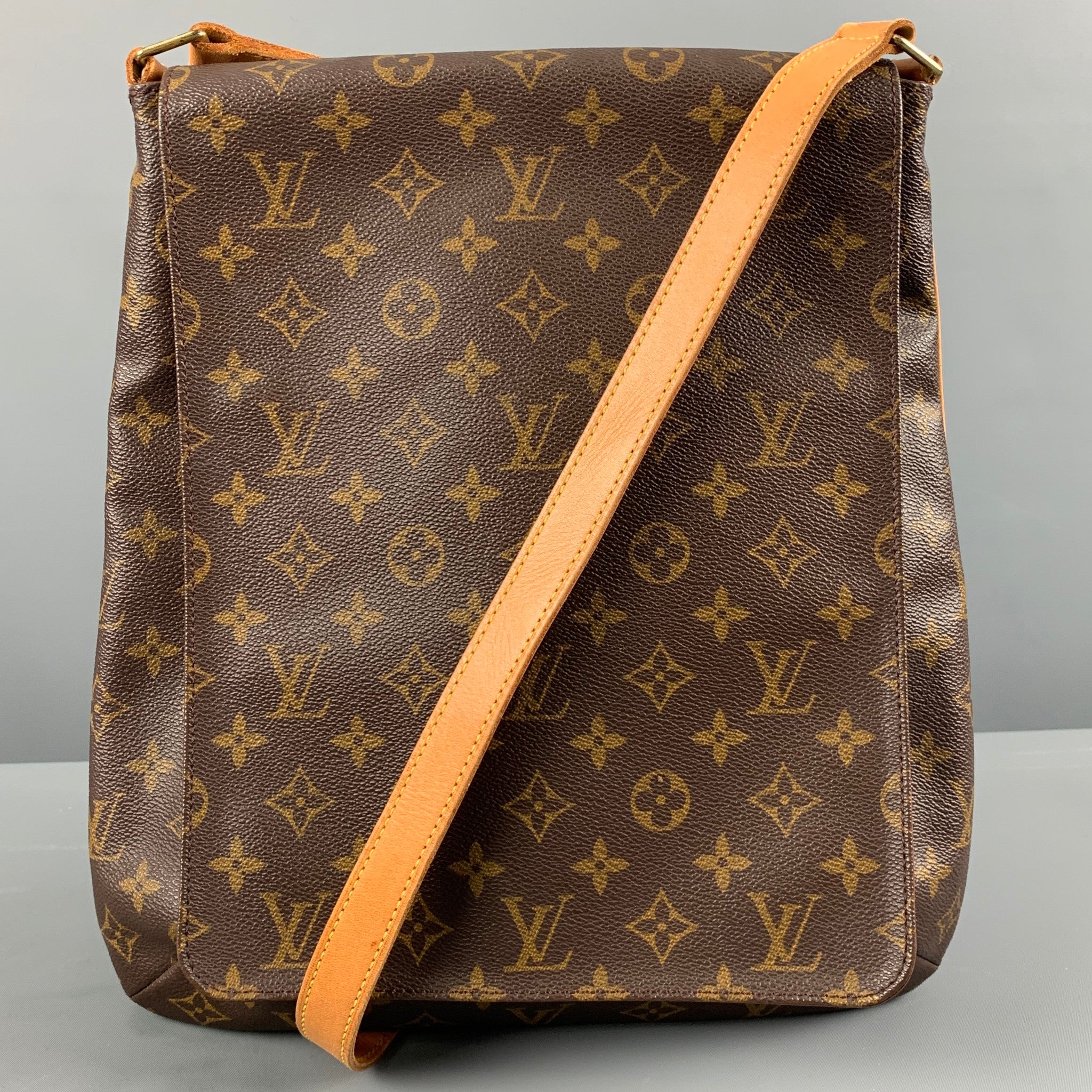 MCM Red Embossed Monogram Leather Belt Bag – Sui Generis Designer  Consignment