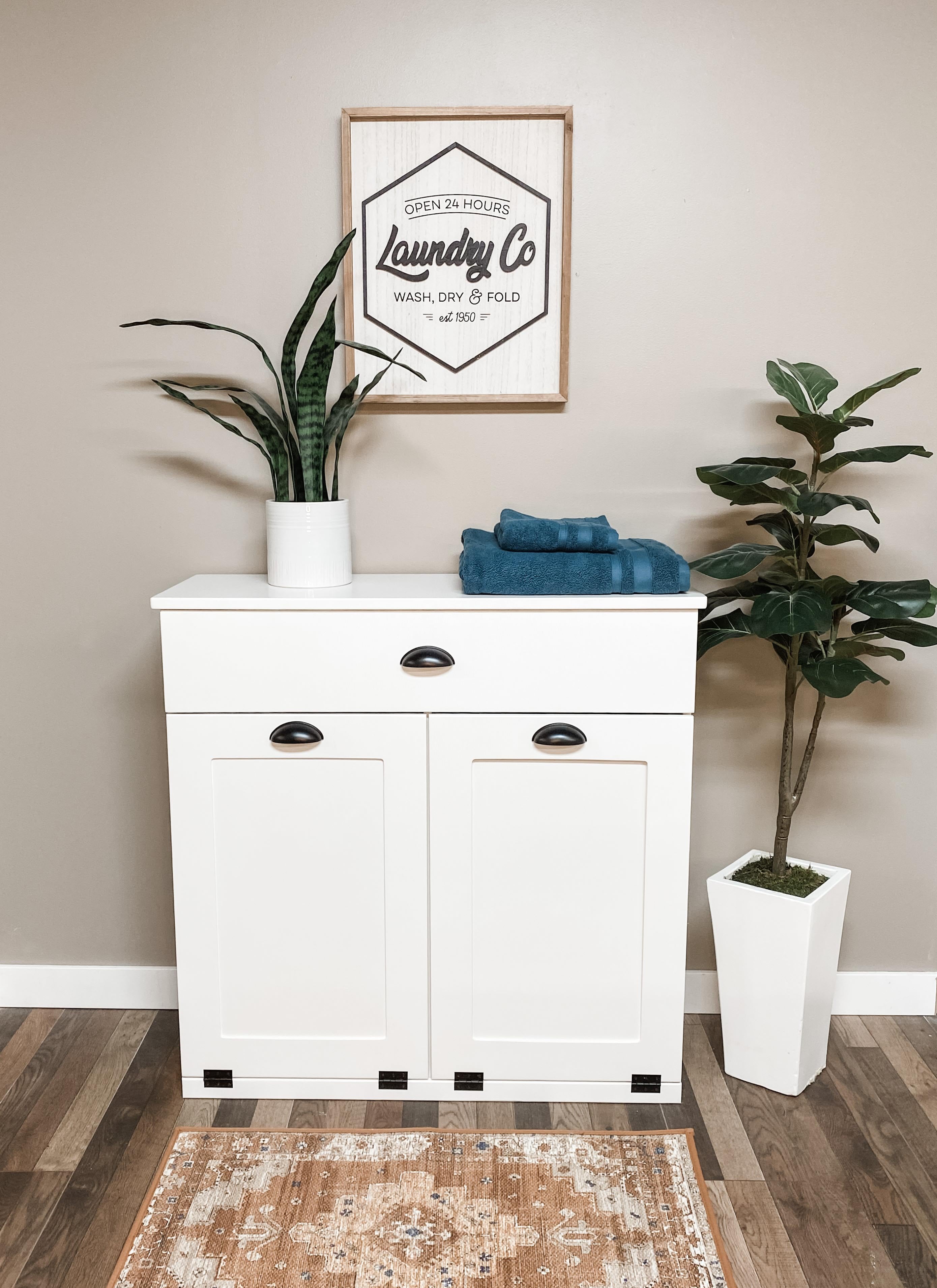 Dashwood laundry with a storage drawer in white farmhouse style door