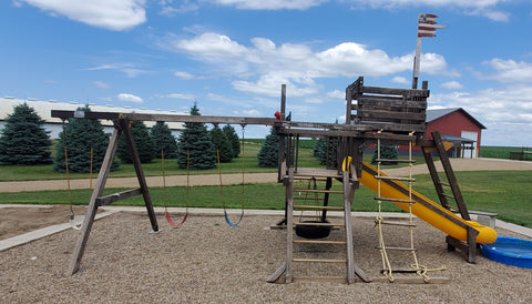 Swing Set Needing Attention and Stain Before