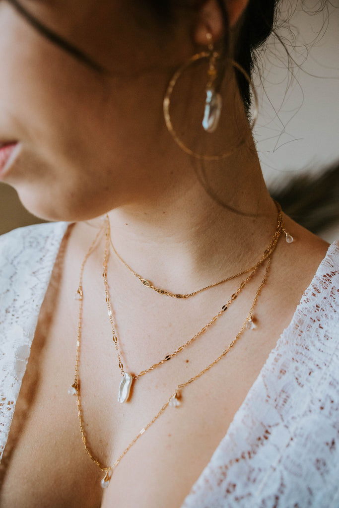 sea tropical destination wedding desert earrings necklace bracelet elopement jewelry boho accessories chic simple gold handmade custom usa made tree myriah pearls diamonds moonstone refined adventurous love story souls