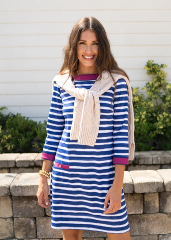 Boston Cabana Shift Dress with sweater wrapped around shoulders.