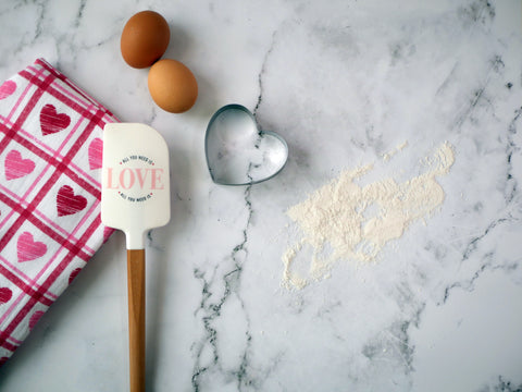 Making valentine's cookies.