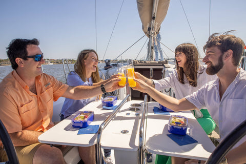 People having brunch on a St. Augustine Sailing Company boat.