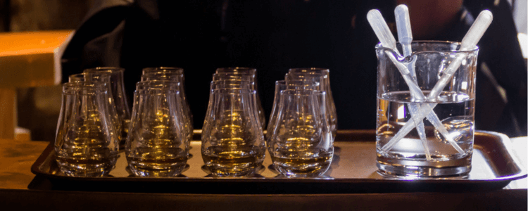 Adding water to whisky with a pipette