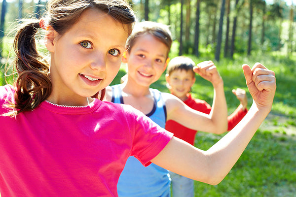 kids flexing strong healthy