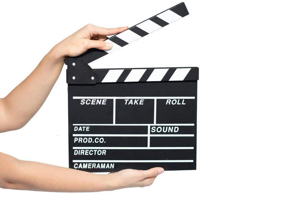 Girl with clapperboard.