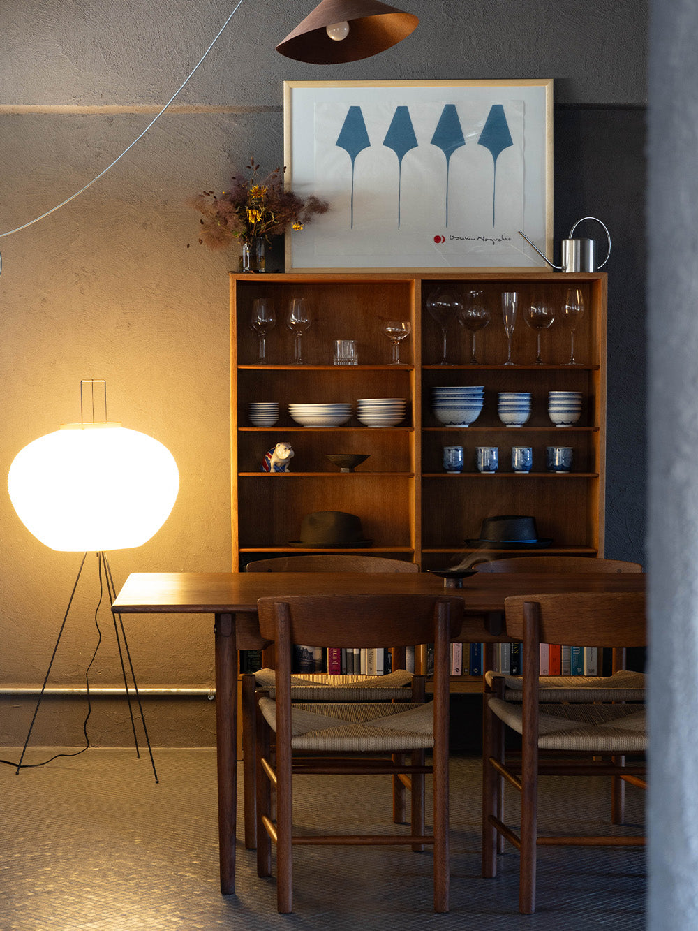 An Akari 10A light display against furnitures from noden