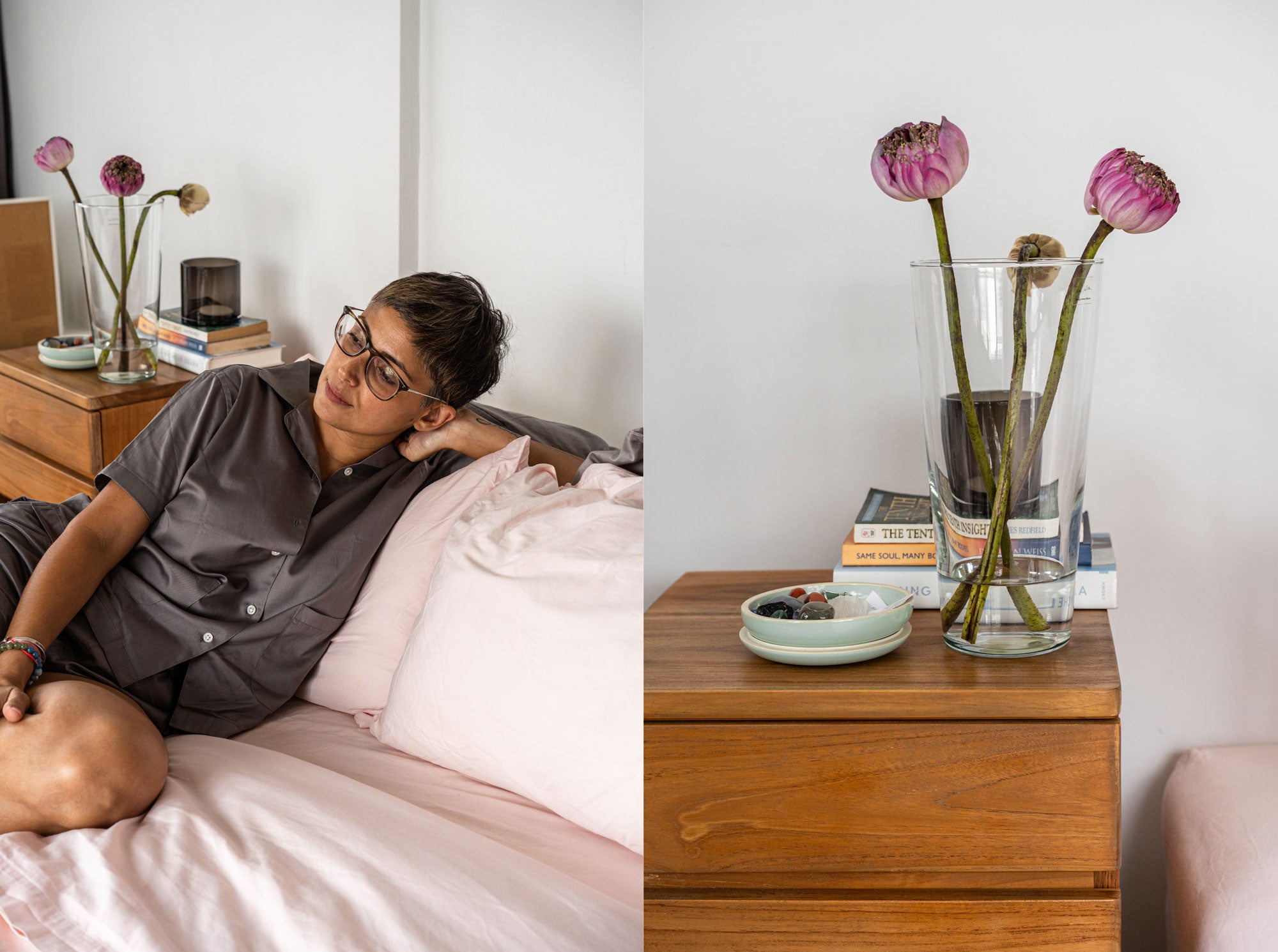 lotus in glass vase on wooden bedside table