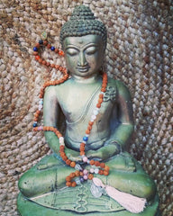 mala beads with buddha