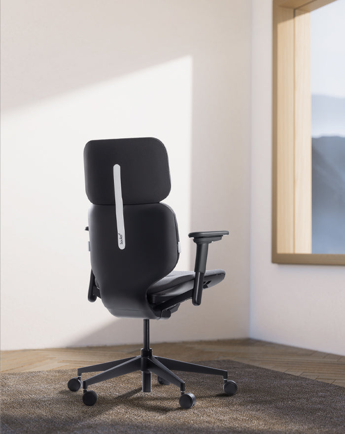 boulies black fit office chair in a room with window