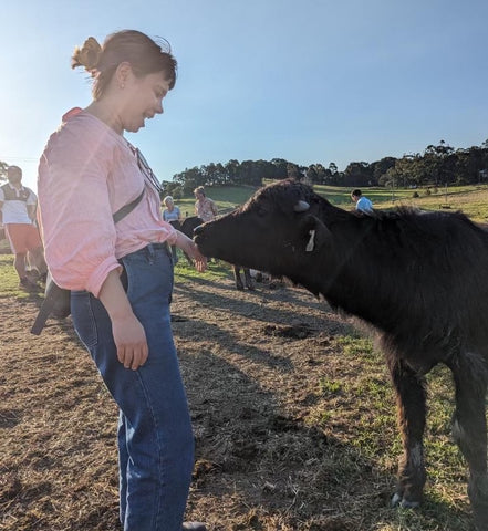 Hannah with calf Burraduc staff farm trip